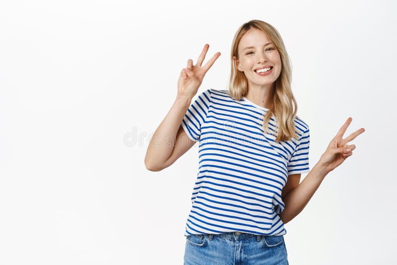 Positive Girl Shows Peace, V-sign and Smiling Happy, Posing in T-shirt ...