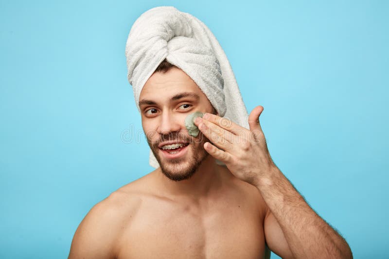 Positive Guy Using Cream after Taking a Shower Stock Photo Image of