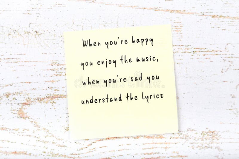 Positive inspiring quote handwritten on sticky note on wooden background royalty free stock photo Positive inspiring quote handwritten on sticky note on wooden background royalty free stock photo