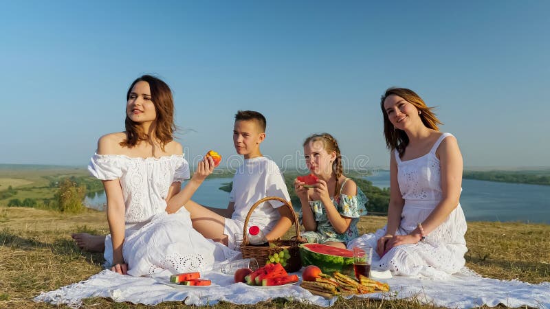 Positive Lady With Daughters And Son On Riverbank At Picnic Stock Image Image Of Glass Drink