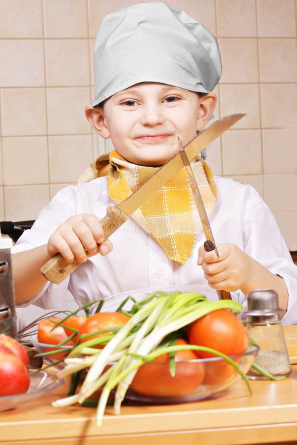 Positive Little Cook with Two Knives Stock Image Image of person