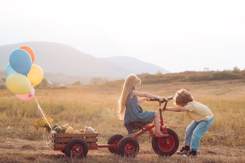 Positive little girl and boy. Cute young boy and girl. Happy little kids. Emotional little girl and boy on a walk. Happy