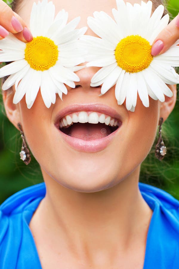 Positive portrait with camomile