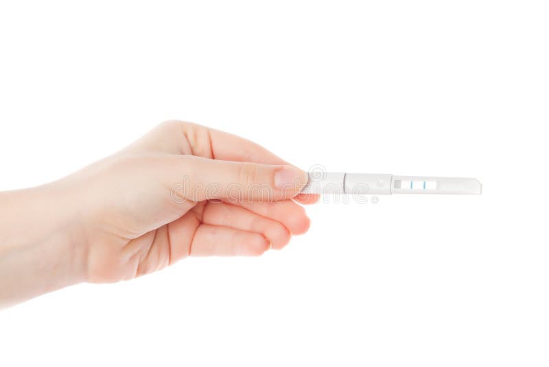 Positive pregnancy test in the hand