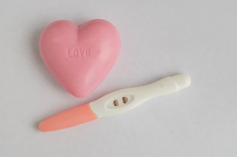 Different Positive Pregnancy Tests with a Pink Heart Stock Image Image of daydreaming, birth