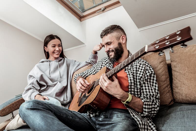 Positive Young Couple Relaxing at Home Together Stock Photo - Image of ...