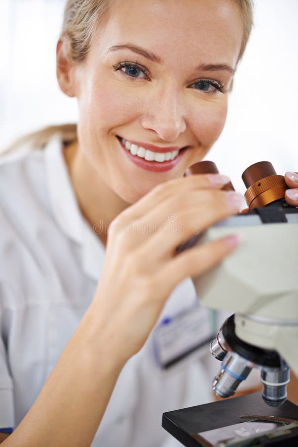 Positivity Magnified. a Beautiful Woman in a Laboratory Working with a