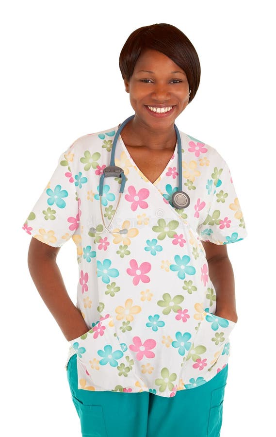 Posizione sorridente dell'infermiera dell'afroamericano fotografia stock Posizione sorridente dell'infermiera dell'afroamericano fotografia stock