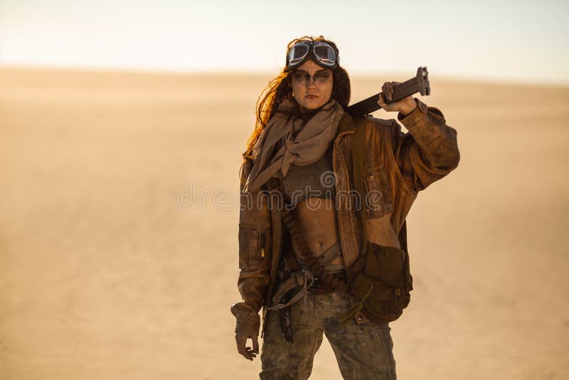 Armed Post-apocalyptic Woman Outdoors in a Wasteland