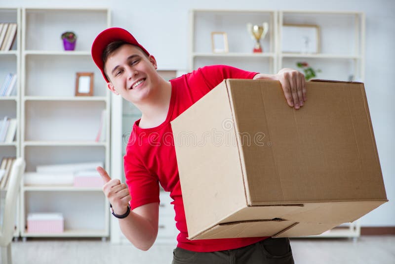 The post man delivering a parcel package. Logistics, business.