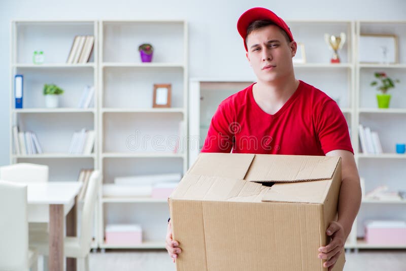 The post man delivering a parcel package. Courier, cardboard.