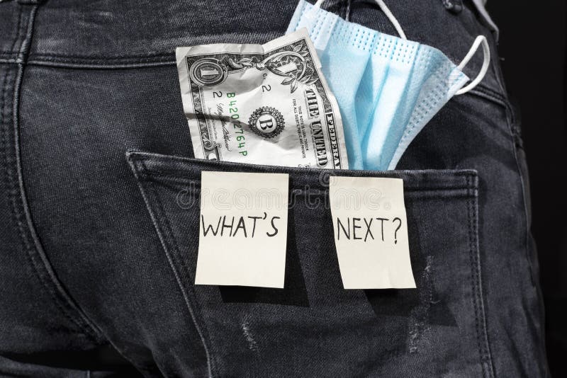 Post pandemic crisis of finance, business, economy. What`s next - text, dollar and medical mask in jeans pocket of man