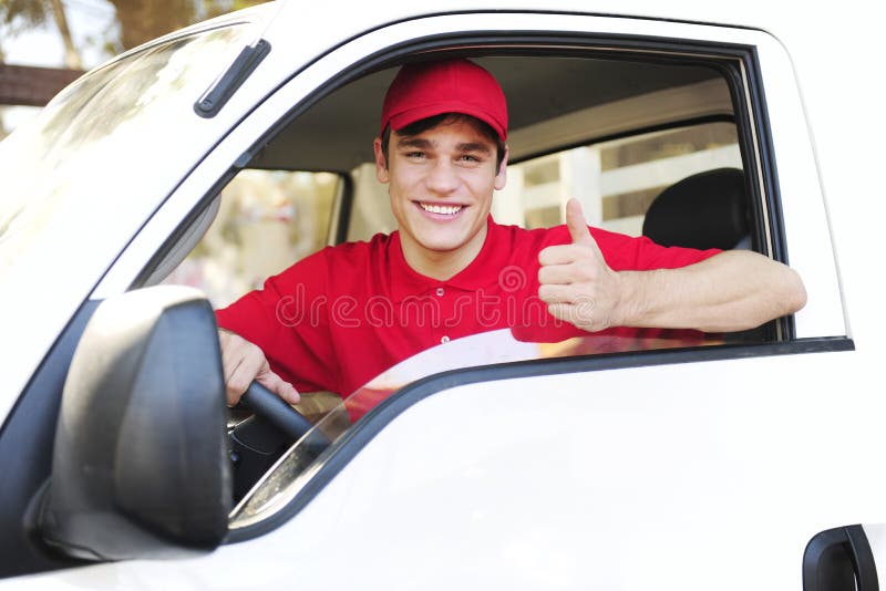 Postal delivery courier in a van stock photography Postal delivery courier in a van stock photography