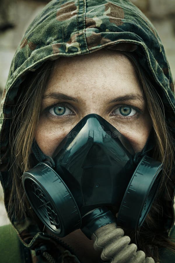 Post apocalypse. Female survivor in gas mask. Post apocalypse. Female survivor in gas mask