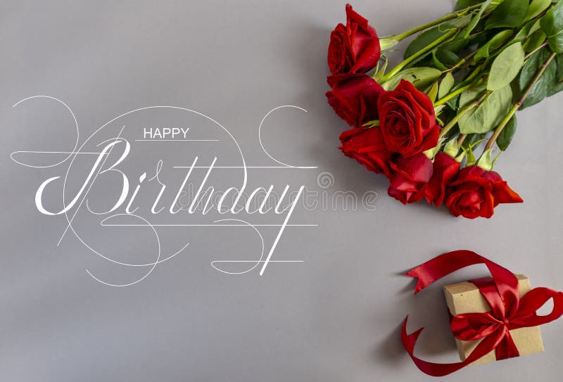 Postcard , Internet banner , flat lay with a birthday greeting, with the inscription - happy birthday  With red roses