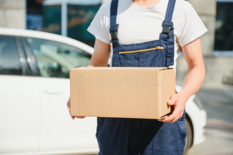 Postman with Parcel Box. Postal Delivery Service Stock Photo Image of