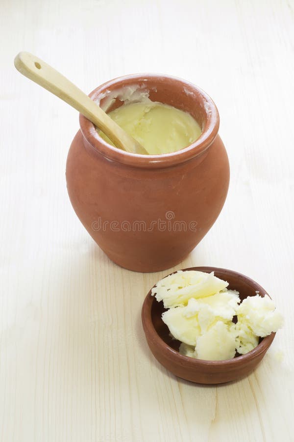 Pot with butter stock image. Image of milk, bowl, closeup 20432889