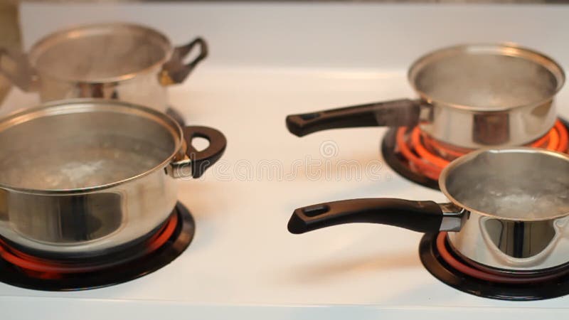 Pot Boiling Water On Stove Rapid Stock Footage Video (100% Royalty-free)  1967887