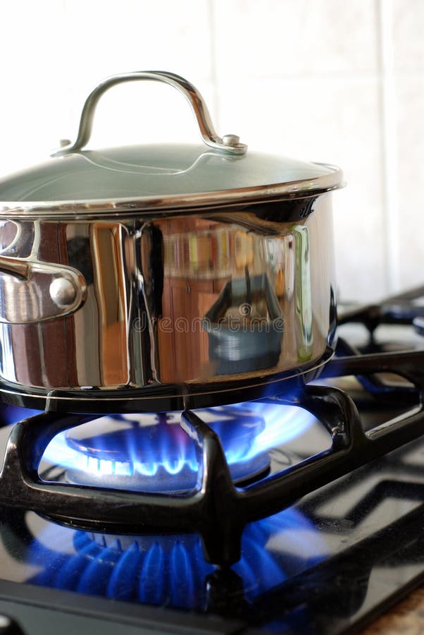 Pot on a gas burner stock photo. Image of tilt, stainless 6780484