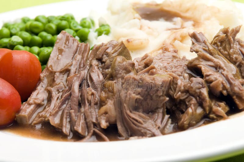Pot roast beef dinner vegetables stock image