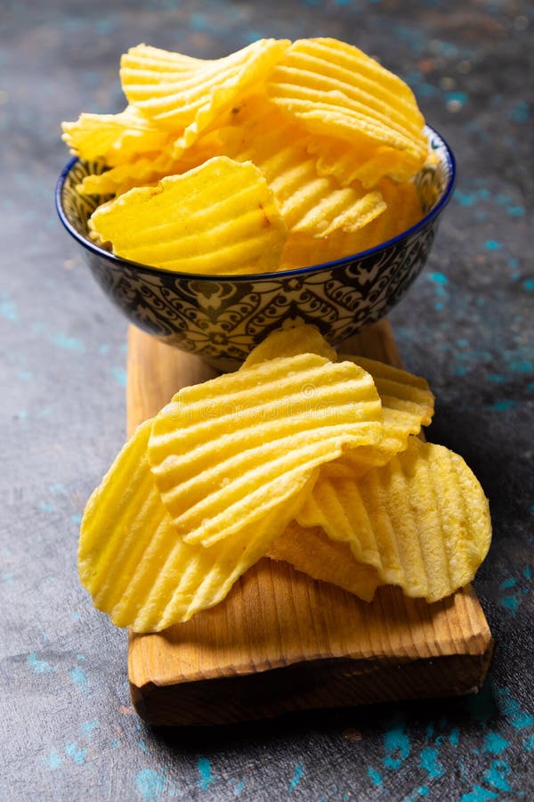 Potato chips or crisps stock image. Image of crisps 206338947
