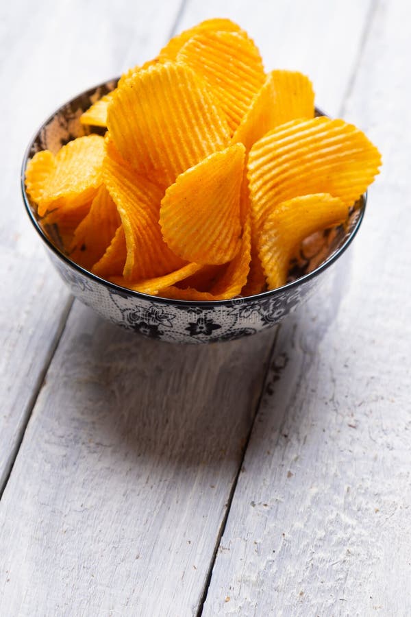 Potato chips or crisps stock image. Image of chips, salty 206339449
