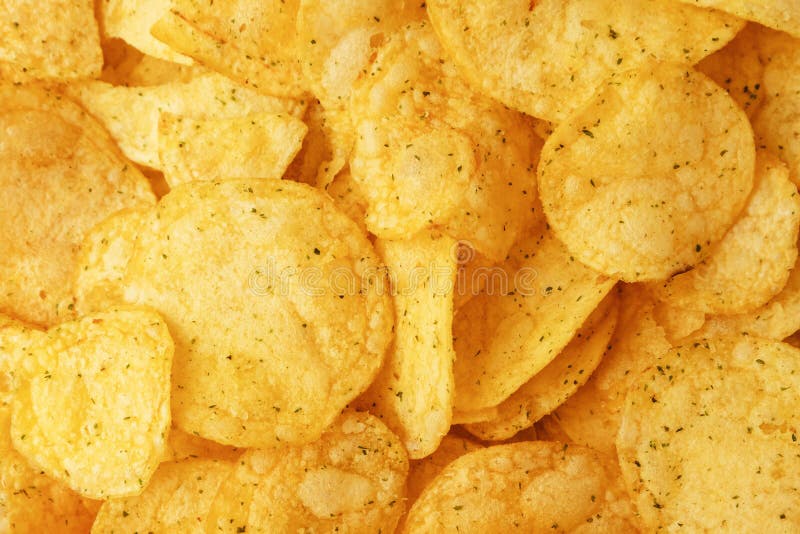 Potato Chips with Green Onions. Background Chips Closeup. Stock Photo