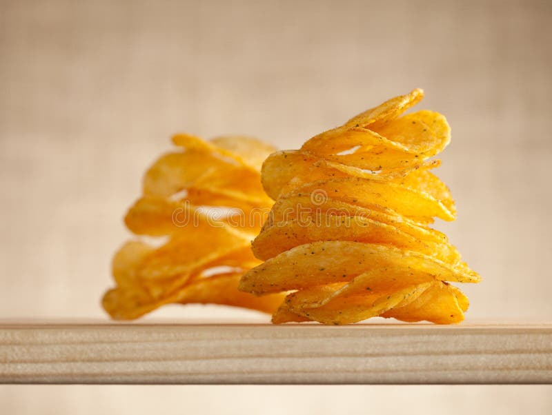 Potato crisps two stacks, focus on the first one