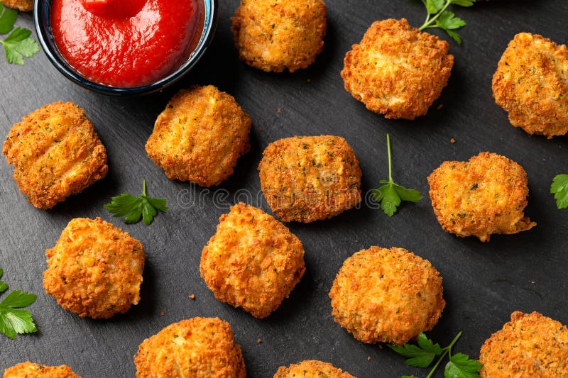 Potato Croquettes with Ham and Cheese on Stone Board Stock Photo