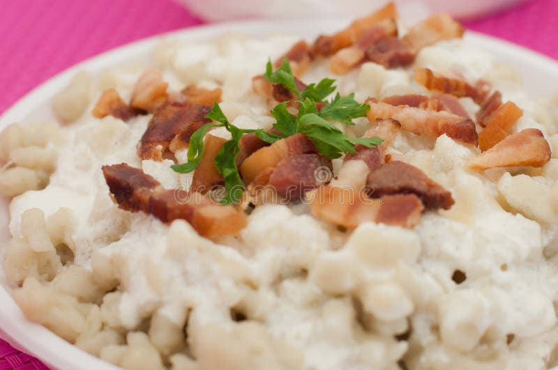 Potato gnocchi dumplings with sheep cheese and bacon stock photos Potato gnocchi dumplings with sheep cheese and bacon stock photos