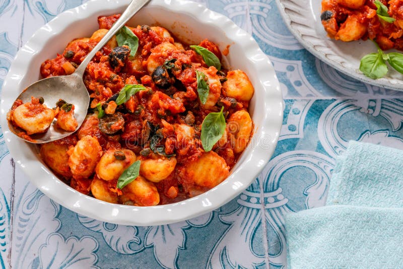 Gnocchi with Puttanesca Sauce Stock Photo - Image of puttanesca ... Gnocchi with Puttanesca Sauce Stock Photo - Image of puttanesca ...
