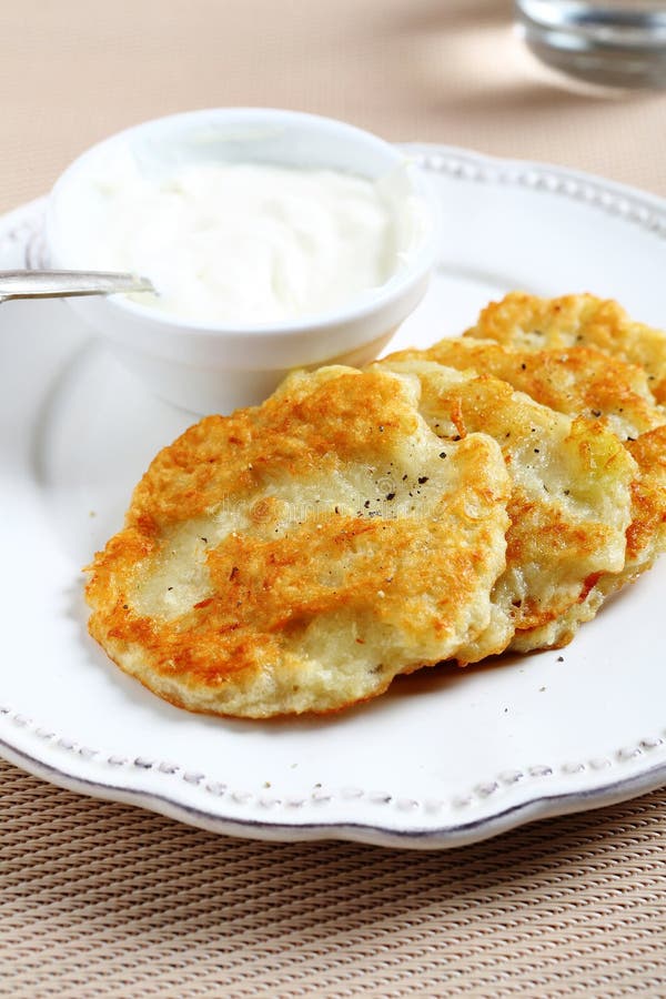 Potato pancakes with sour cream