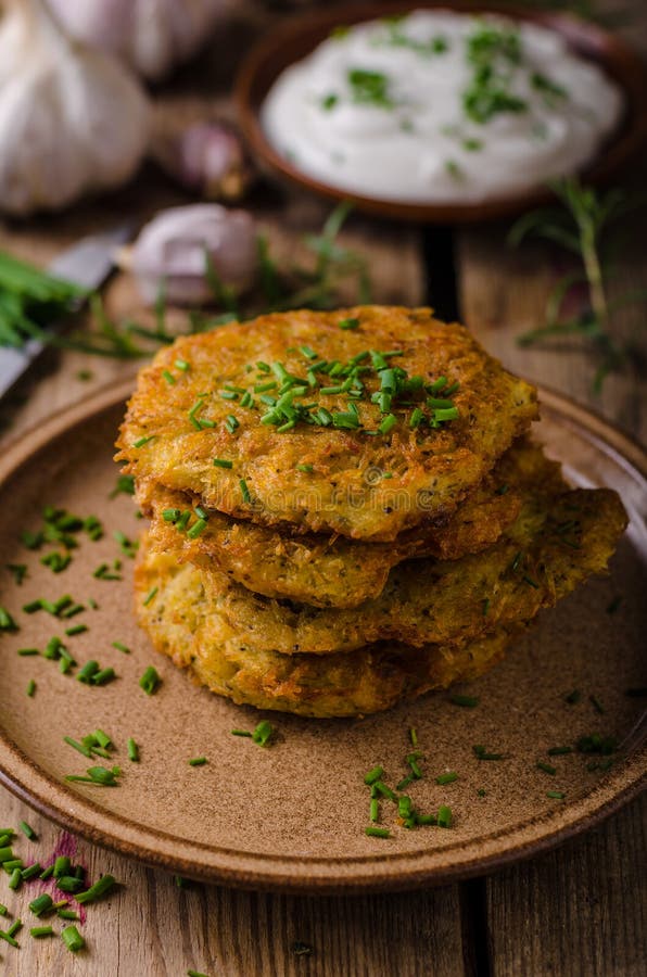 Potato Pancakes with Sour Cream Stock Photo - Image of cooking, golden ...