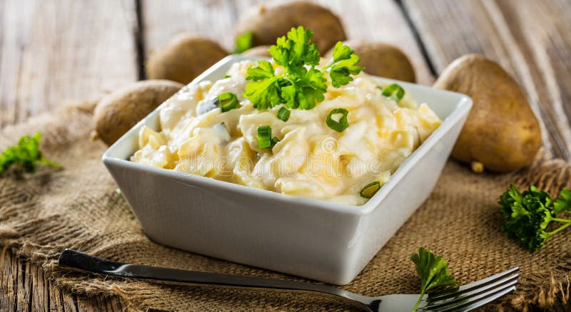 Potato salad with yoghurt and mayonnaise dressing with chives. stock photography Potato salad with yoghurt and mayonnaise dressing with chives. stock photography