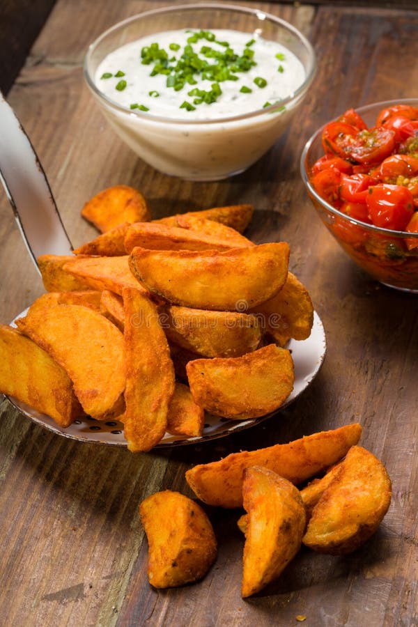 Potato Wedges with Dip and Roasted Tomatoes Stock Photo Image of