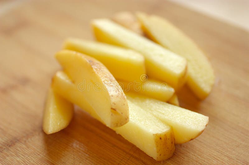 Potatoes are sliced julienne