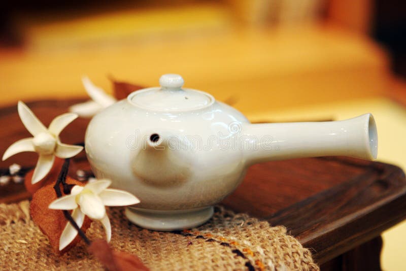 White Asian tea pot - shallow DOF. White Asian tea pot - shallow DOF