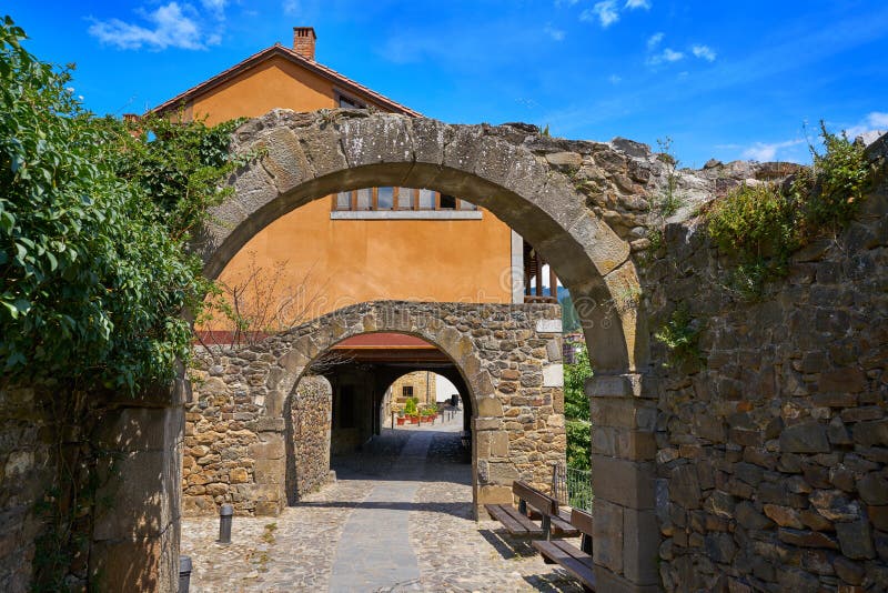 Potes village arch arcades in Cantabria Spain royalty free stock images