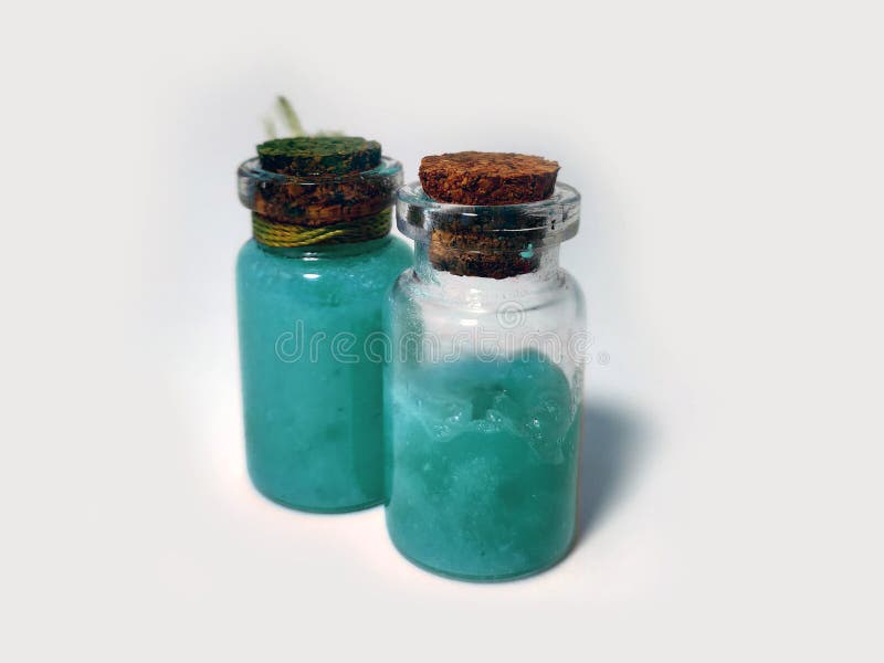 Potions with azure liquid. Alchemy set with flasks. small glass bottles with colored liquid for game role play. magic potions with royalty free stock image