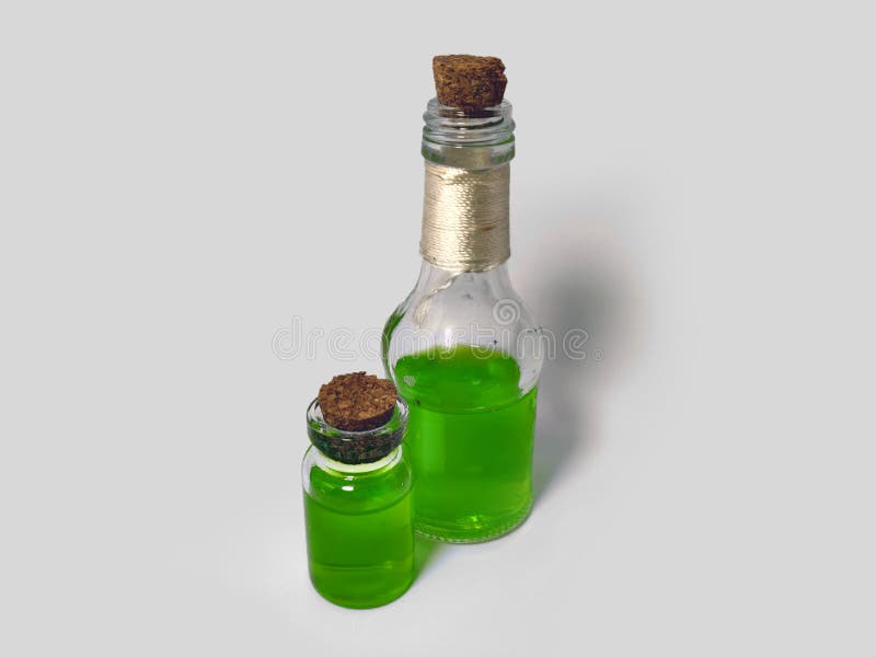 Potions with green liquid. Alchemy set with flasks. small glass bottles with colored liquid for game role play. magic potions with stock image
