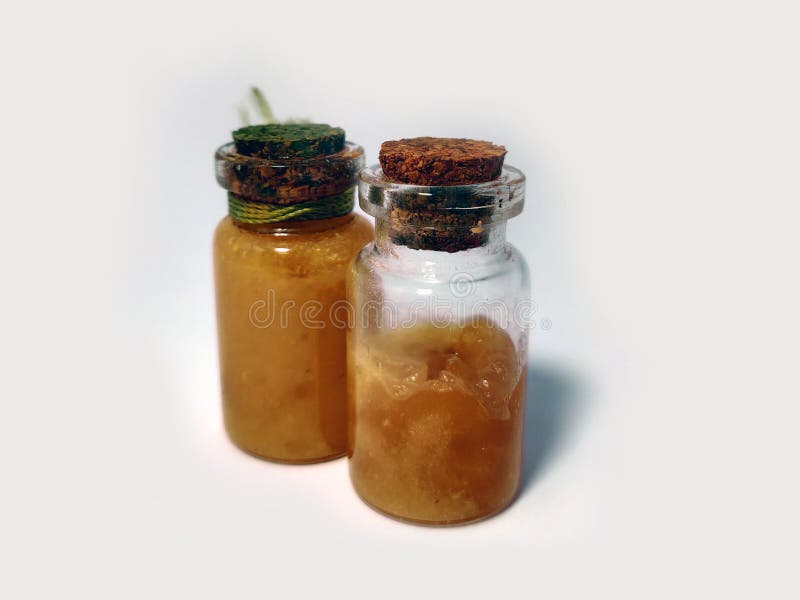 Potions with orange liquid. Alchemy set with flasks. small glass bottles with colored liquid for game role play. magic potions royalty free stock images