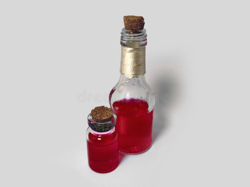 Potions with red liquid. Alchemy set with flasks. small glass bottles with colored liquid for game role play. magic potions with stock photos