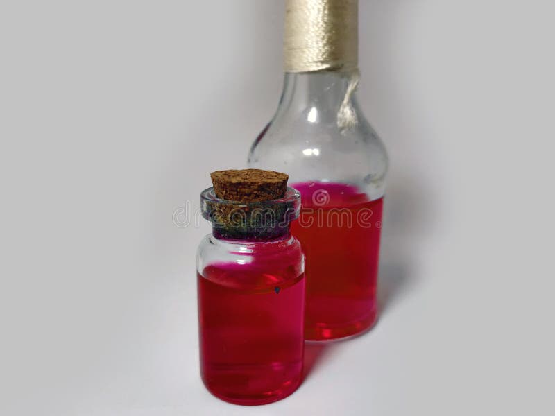 Potions with red liquid. Alchemy set with flasks. small glass bottles with colored liquid for game role play. magic potions with royalty free stock photography
