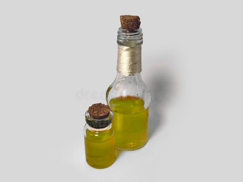 Potions with yellow liquid. Alchemy set with flasks. small glass bottles with colored liquid for game role play. magic potions stock images