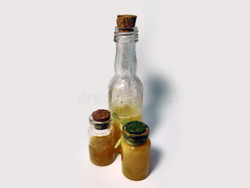 Potions with yellow liquid. Alchemy set with flasks. small glass bottles with colored liquid for game role play. magic potions stock photos