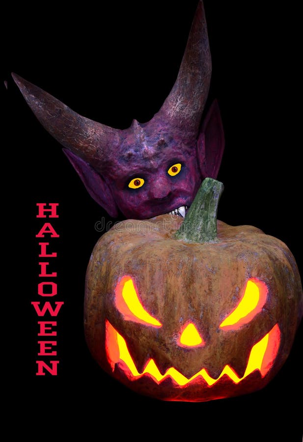 Potiron et diable effrayants avec des klaxons pour Halloween photographie stock Potiron et diable effrayants avec des klaxons pour Halloween photographie stock
