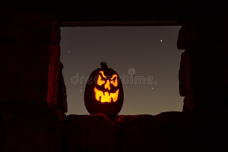 Potirons de Halloween de Lit de bougie photo libre de droits Potirons de Halloween de Lit de bougie photo libre de droits