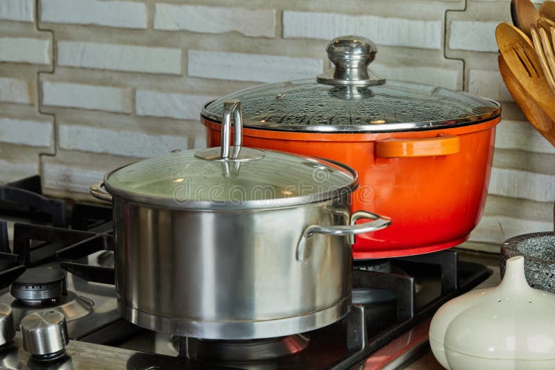 Pots with Cooking Food in the Kitchen on Gas Stove Stock Photo Image
