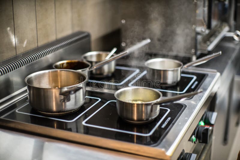Pots on the Stove in the Restaurant. Cooking Food. Stock Photo Image of stainless, water