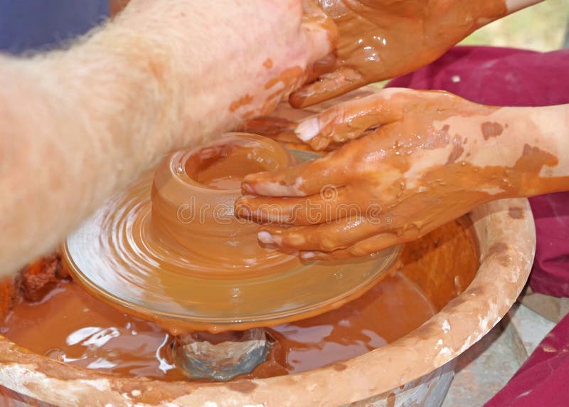 Potter making a clay cup stock image. Image of craft 126150315